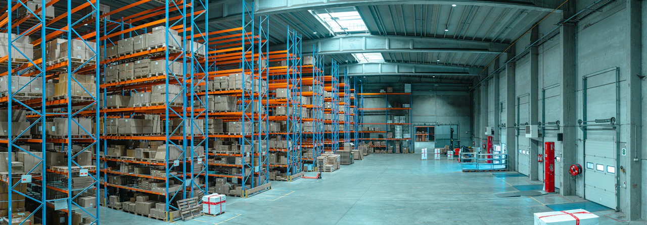 Rows of warehouse shelving stocked with boxed inventory